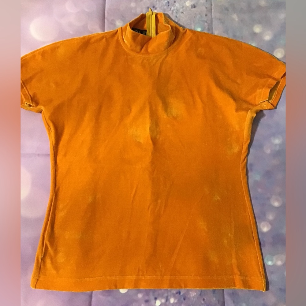 Woman’s Escada I would say this is a size medium stretch fabric turtleneck CC
